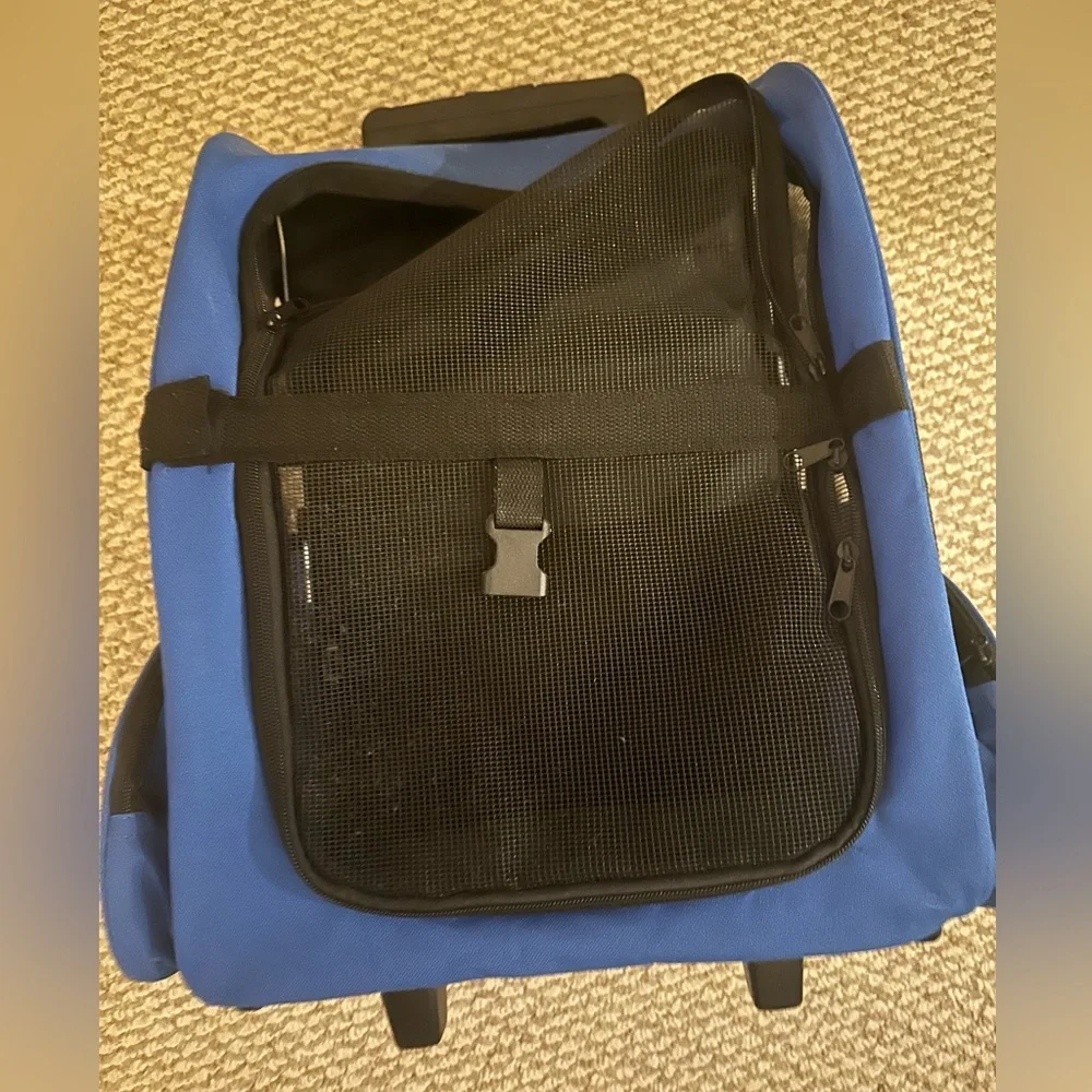 Dog carrier with wheels